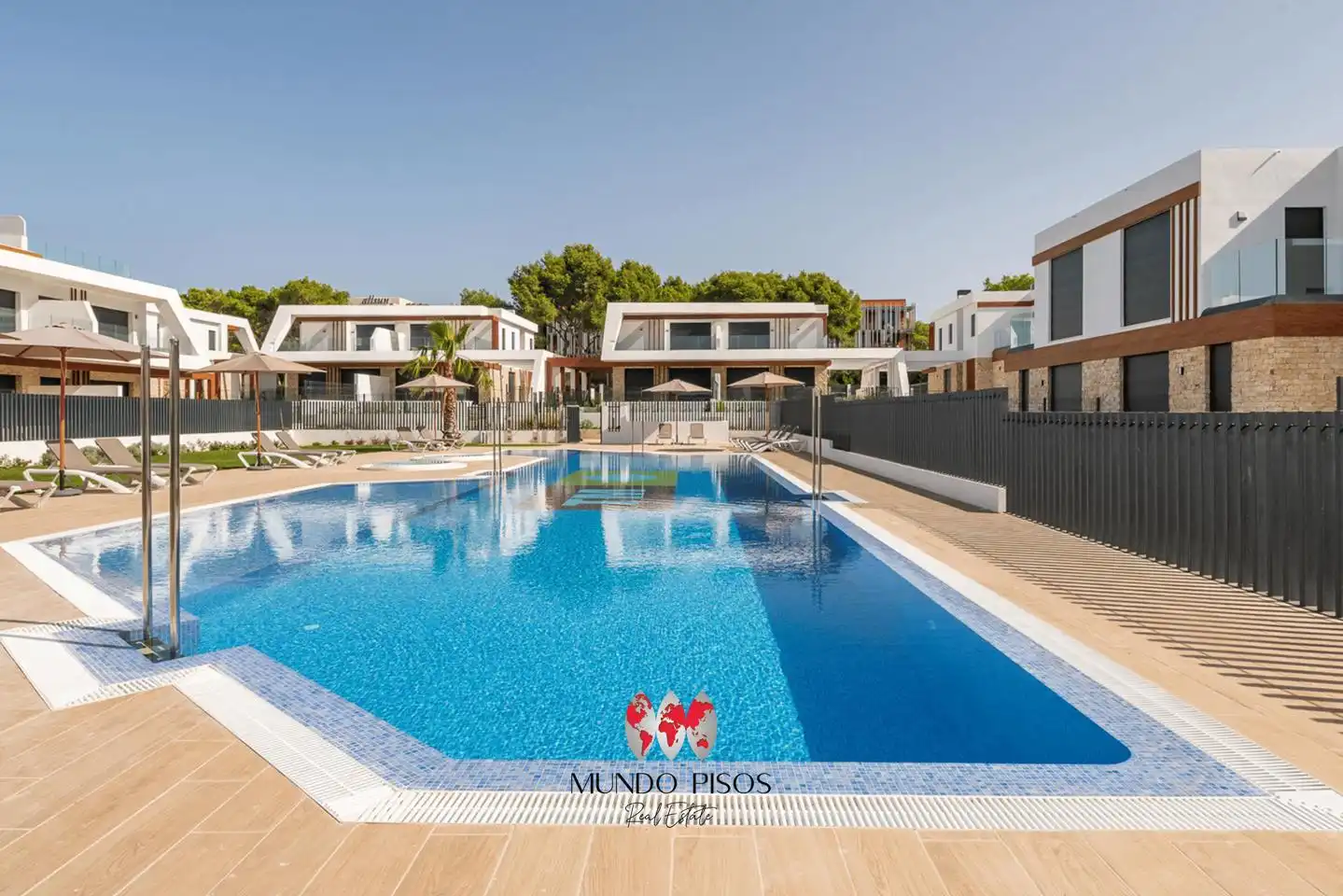Swimming pool of Detached homes for sale in Cala Ratjada