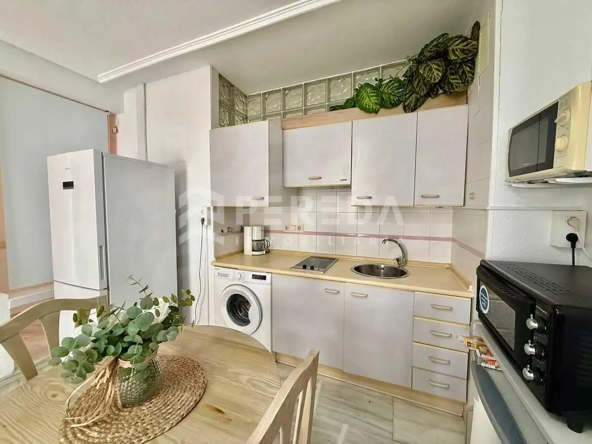 Cocina de Apartamento en venta en Roquetas de Mar con Aire acondicionado, Terraza y Amueblado