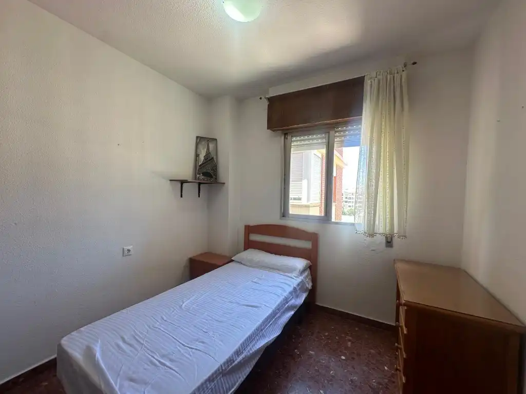 Bedroom of Flat for share in Córdoba