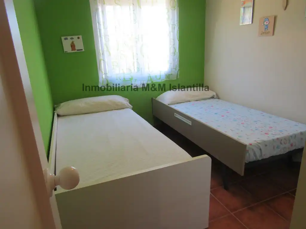 Habitación de Casa adosada en venta en Islantilla con Jardín privado, Terraza y Amueblado