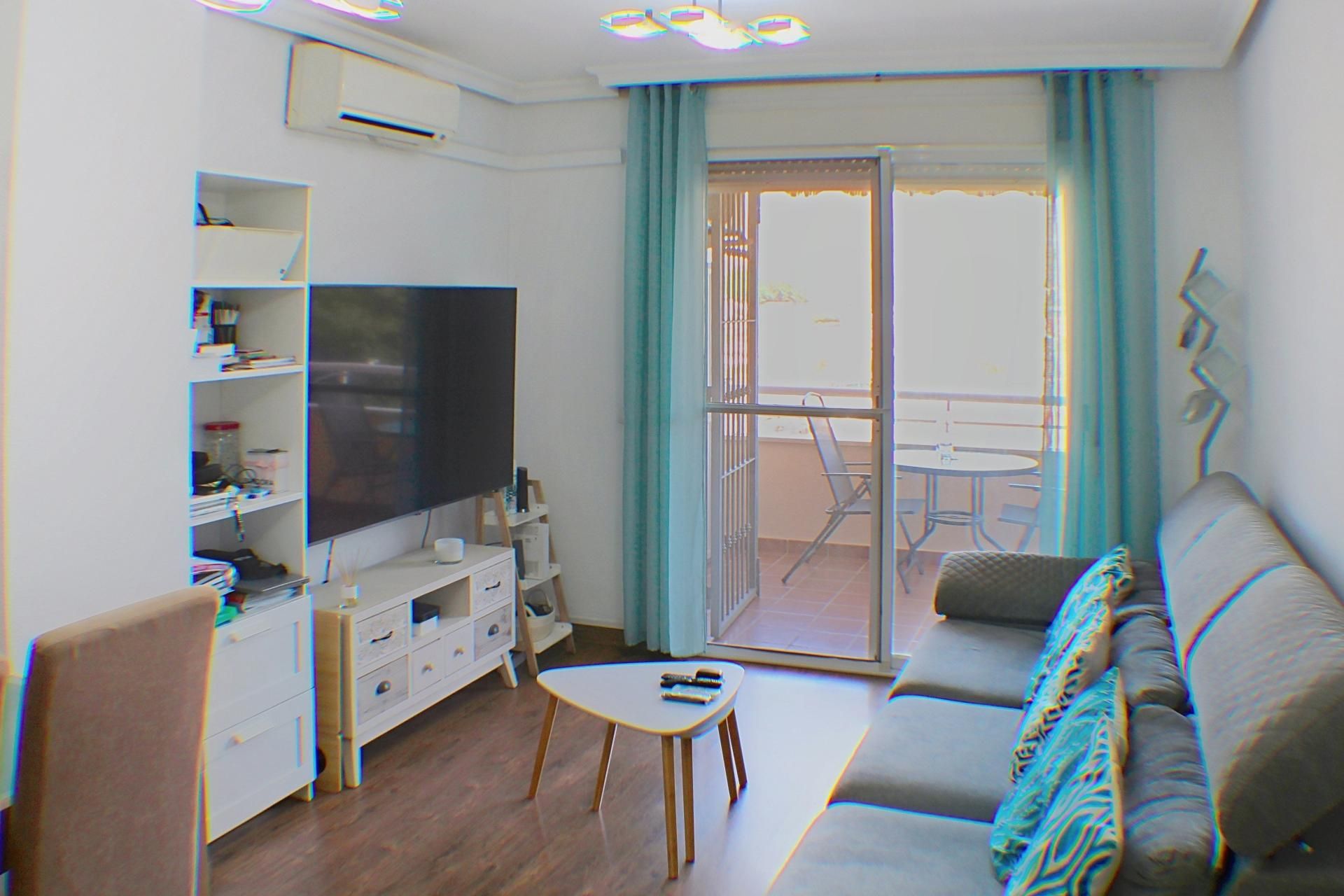 Sala de estar de Piso en venta en  Almería Capital con Terraza y Piscina comunitaria