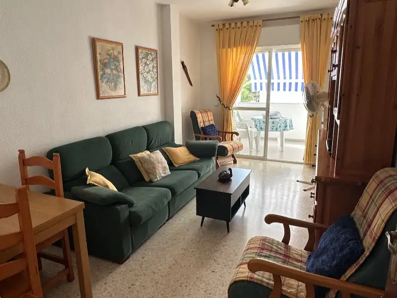 Sala de estar de Apartamento de alquiler en El Portil con Jardín privado, Terraza y Piscina