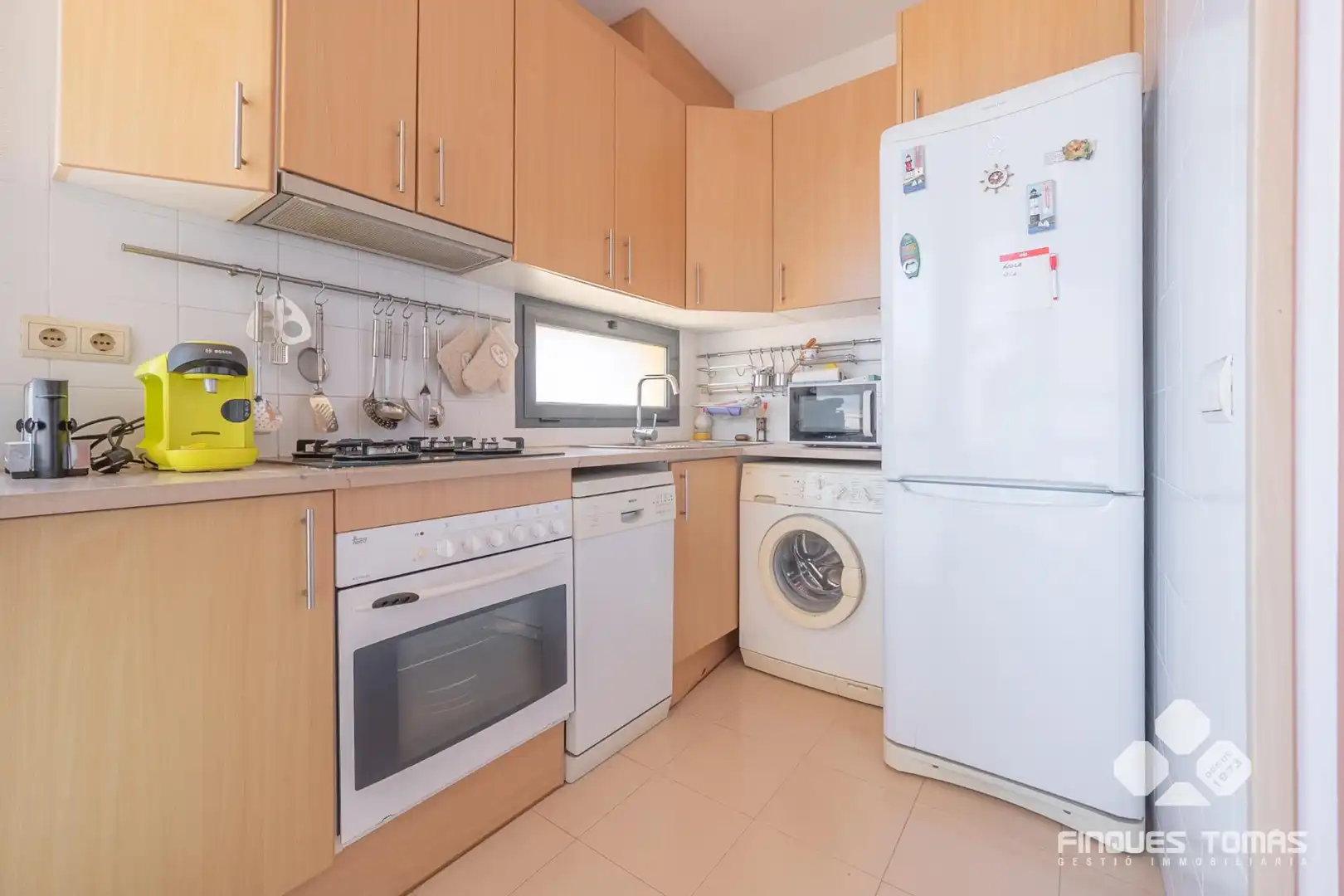 Küche von Wohnung zum Verkauf in Calafell mit Klimaanlage und Balkon