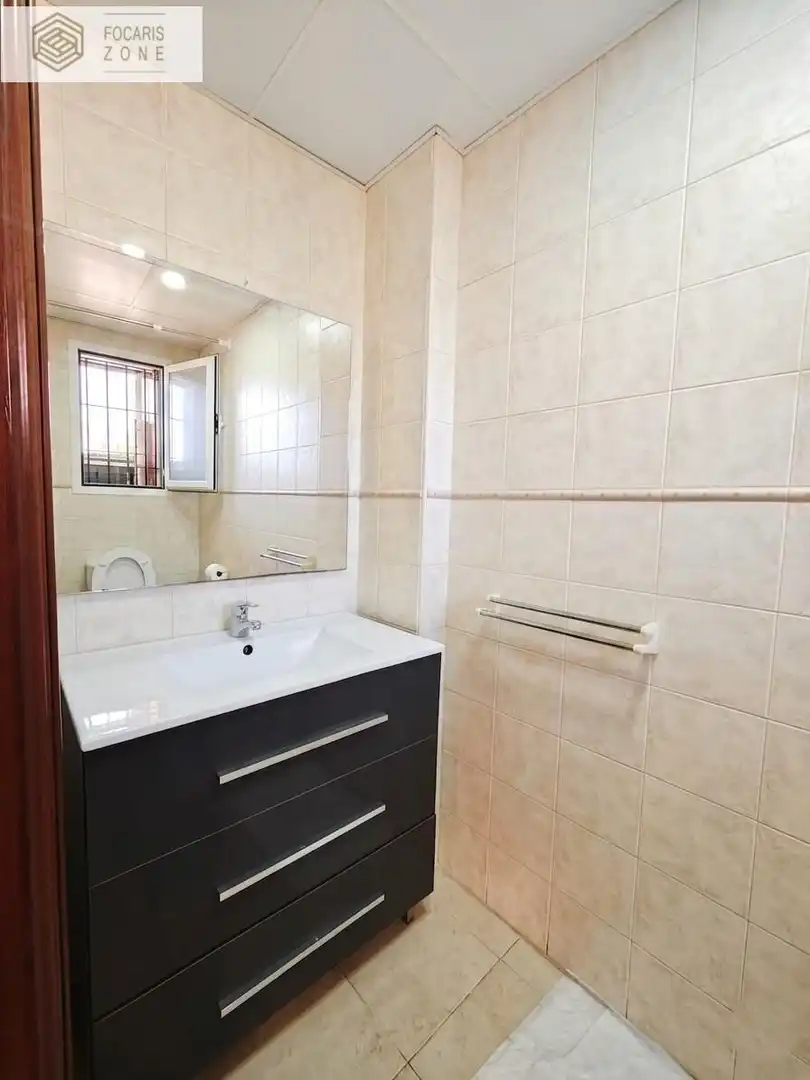 Bany de Casa adosada en venda en Málaga amb Aire condicionat, Calefacció i Jardí privat