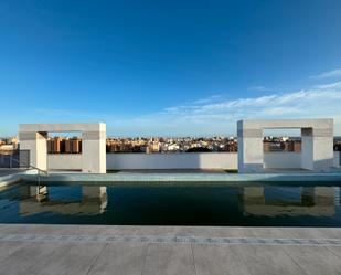 Swimming pool of Flat for sale in  Almería Capital  with Air Conditioner, Terrace and Storage room