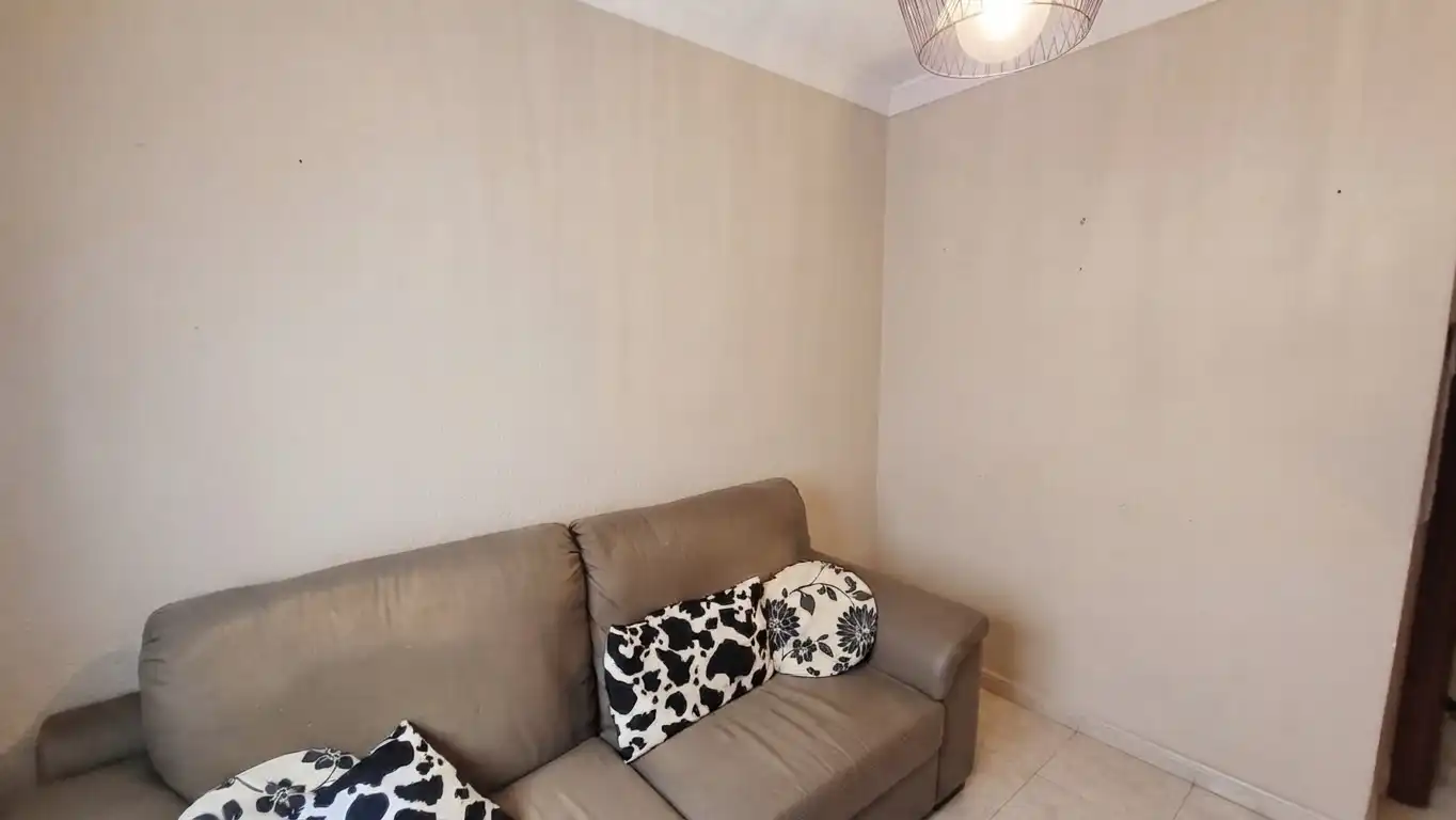 Sala de estar de Piso en venta en Rincón de la Victoria con Aire acondicionado, Trastero y Amueblado