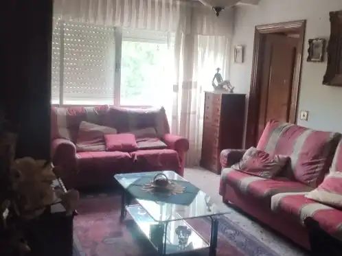 Sala de estar de Piso en venta en  Madrid Capital