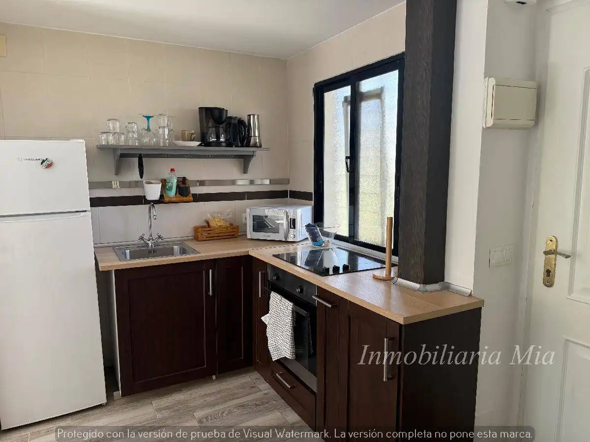 Cuina de Apartament en venda en Torremolinos amb Aire condicionat, Jardí privat i Terrassa