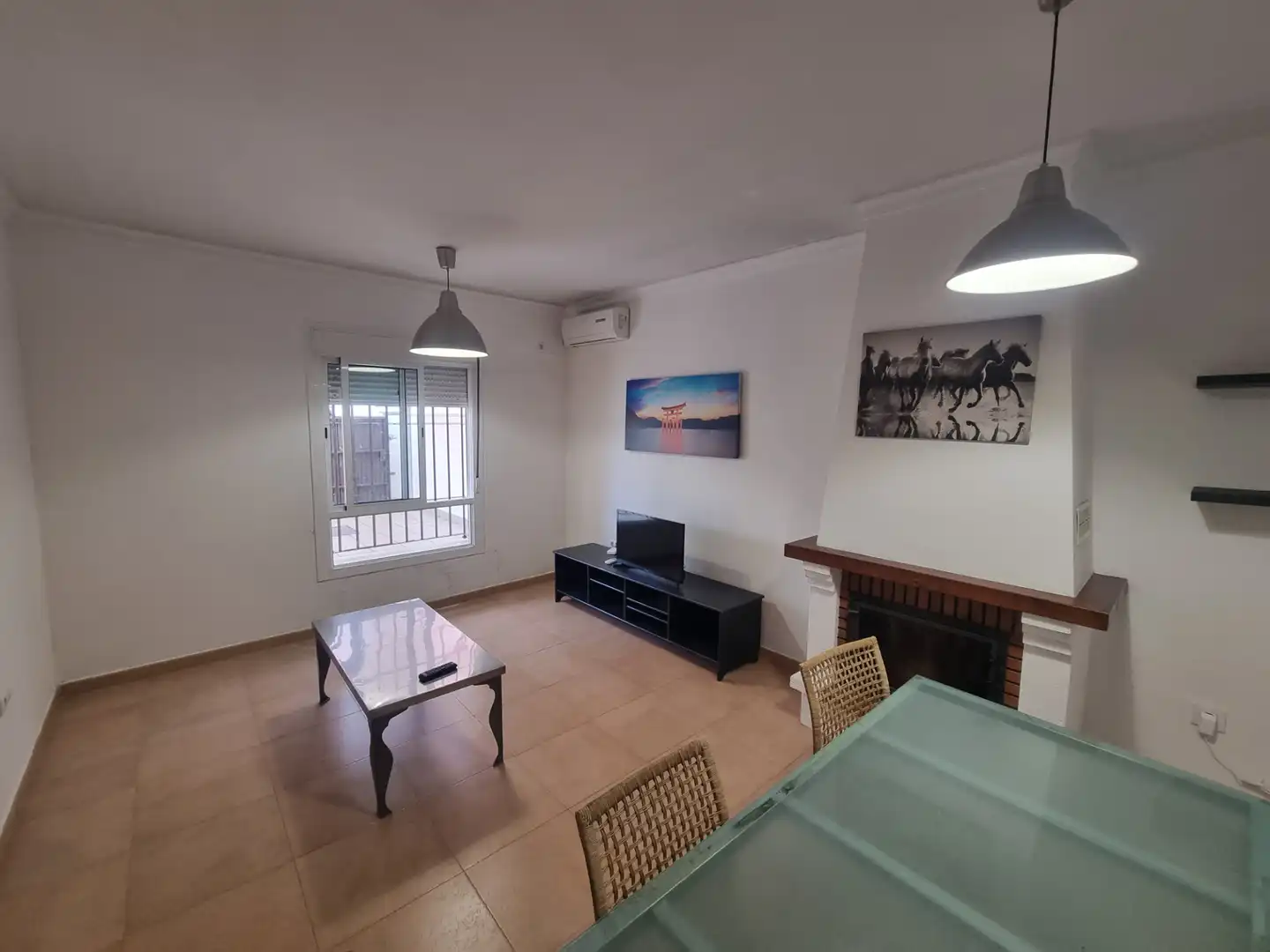 Sala de estar de Casa adosada en venta en Trigueros con Aire acondicionado, Jardín privado y Terraza