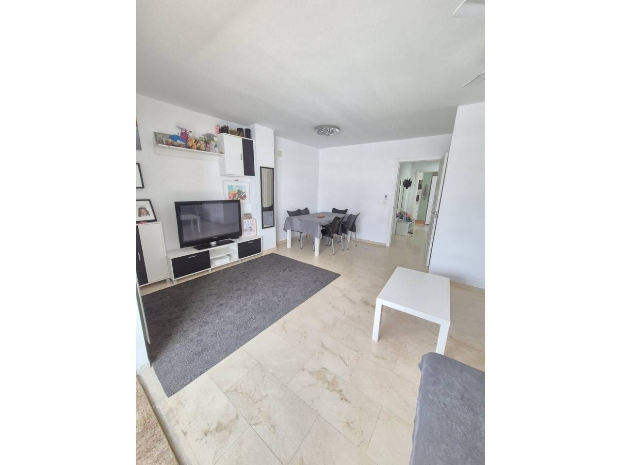 Living room of Flat for sale in Estepona  with Air Conditioner, Terrace and Alarm