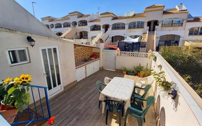Terrassa de Casa adosada en venda en Santa Pola amb Aire condicionat, Calefacció i Jardí privat