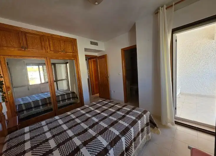 Dormitori de Casa adosada en venda en La Manga del Mar Menor amb Aire condicionat, Jardí privat i Terrassa