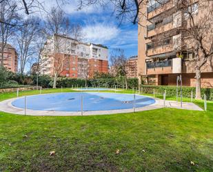 Swimming pool of Flat for sale in  Madrid Capital  with Air Conditioner, Heating and Community pool