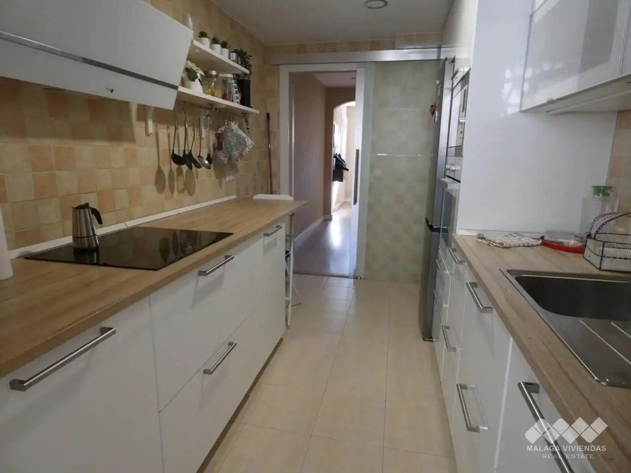 Küche von Einfamilien-Reihenhaus zum Verkauf in Alhaurín de la Torre mit Klimaanlage, Terrasse und Abstellraum