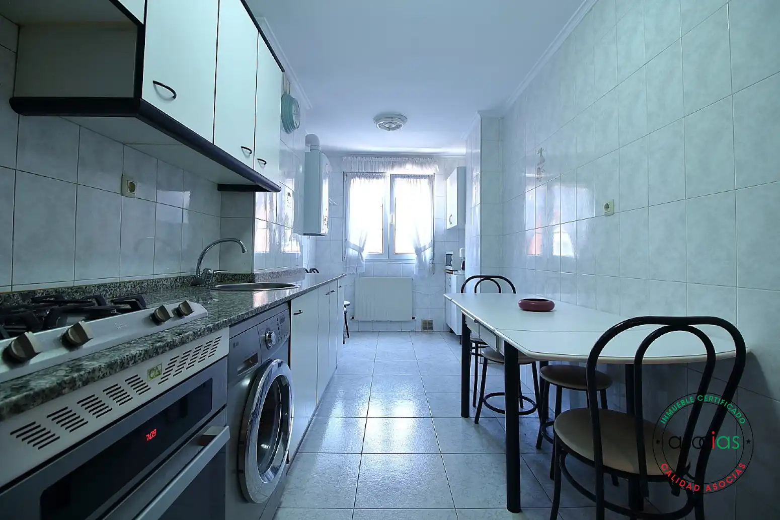 Kitchen of Flat for sale in Gijón   with Heating, Parquet flooring and Storage room