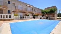 Swimming pool of Single-family semi-detached for sale in Alcanar  with Air Conditioner and Terrace