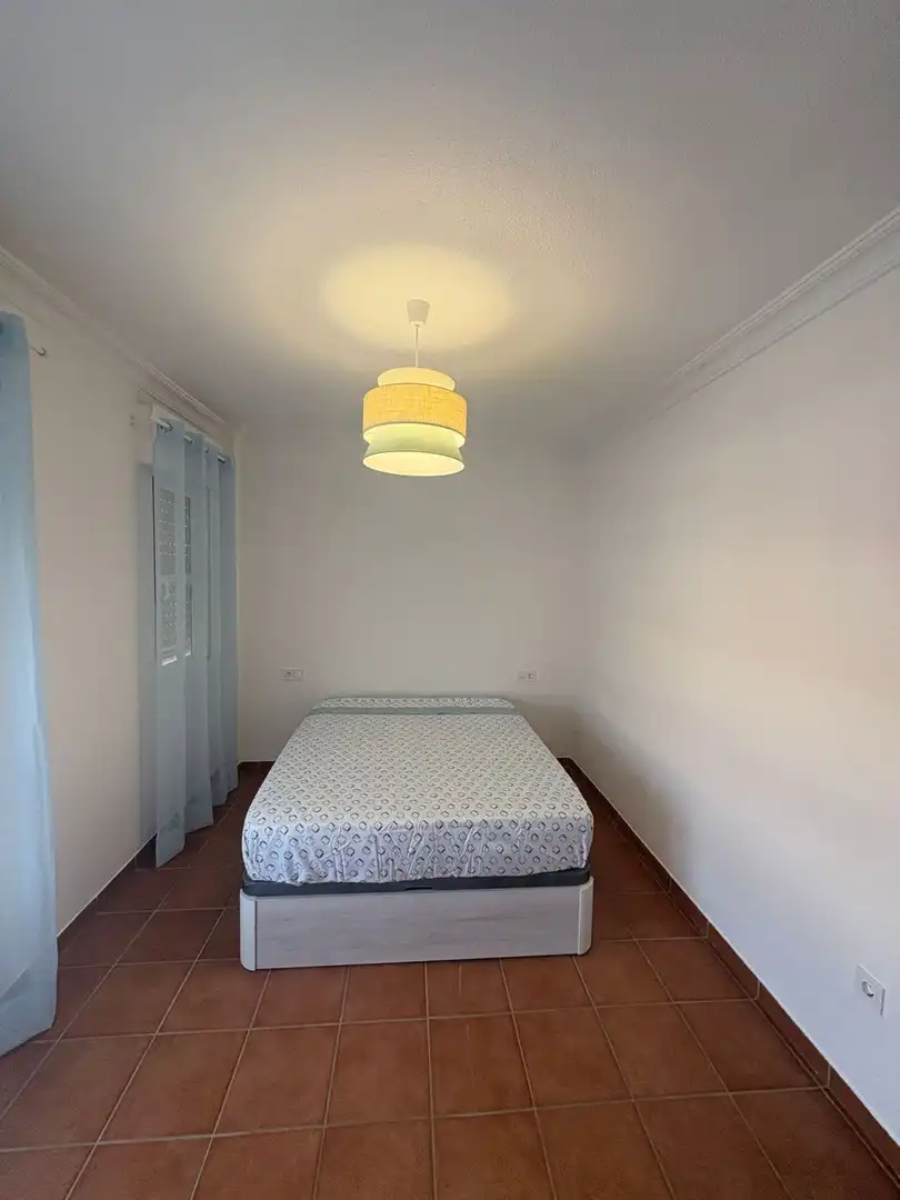 Dormitori de Casa o xalet de lloguer en Aljaraque amb Terrassa i Moblat