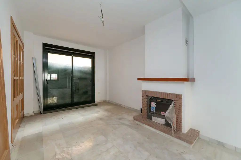 Sala d'estar de Casa adosada en venda en Vélez-Málaga