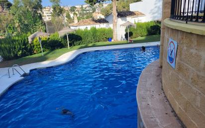 Swimming pool of Apartment for sale in Benalmádena  with Furnished and Community pool