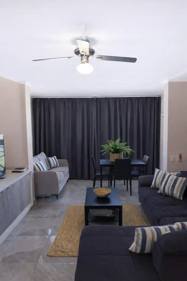 Sala d'estar de Apartament en venda en San Miguel de Abona amb Aire condicionat, Jardí privat i Moblat
