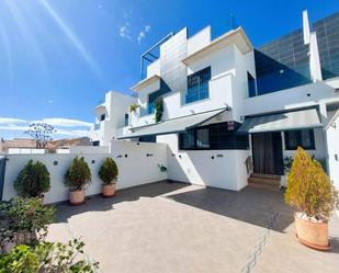 Exterior view of Single-family semi-detached for sale in Pilar de la Horadada  with Air Conditioner, Private garden and Terrace