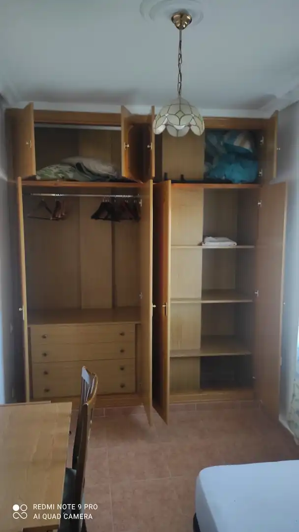 Dormitori de Apartament de lloguer en Cáceres amb Aire condicionat, Calefacció i Moblat