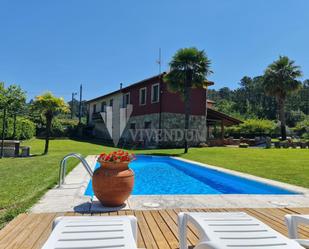 Vista exterior de Casa o xalet en venda en A Cañiza   amb Terrassa, Piscina i Balcó