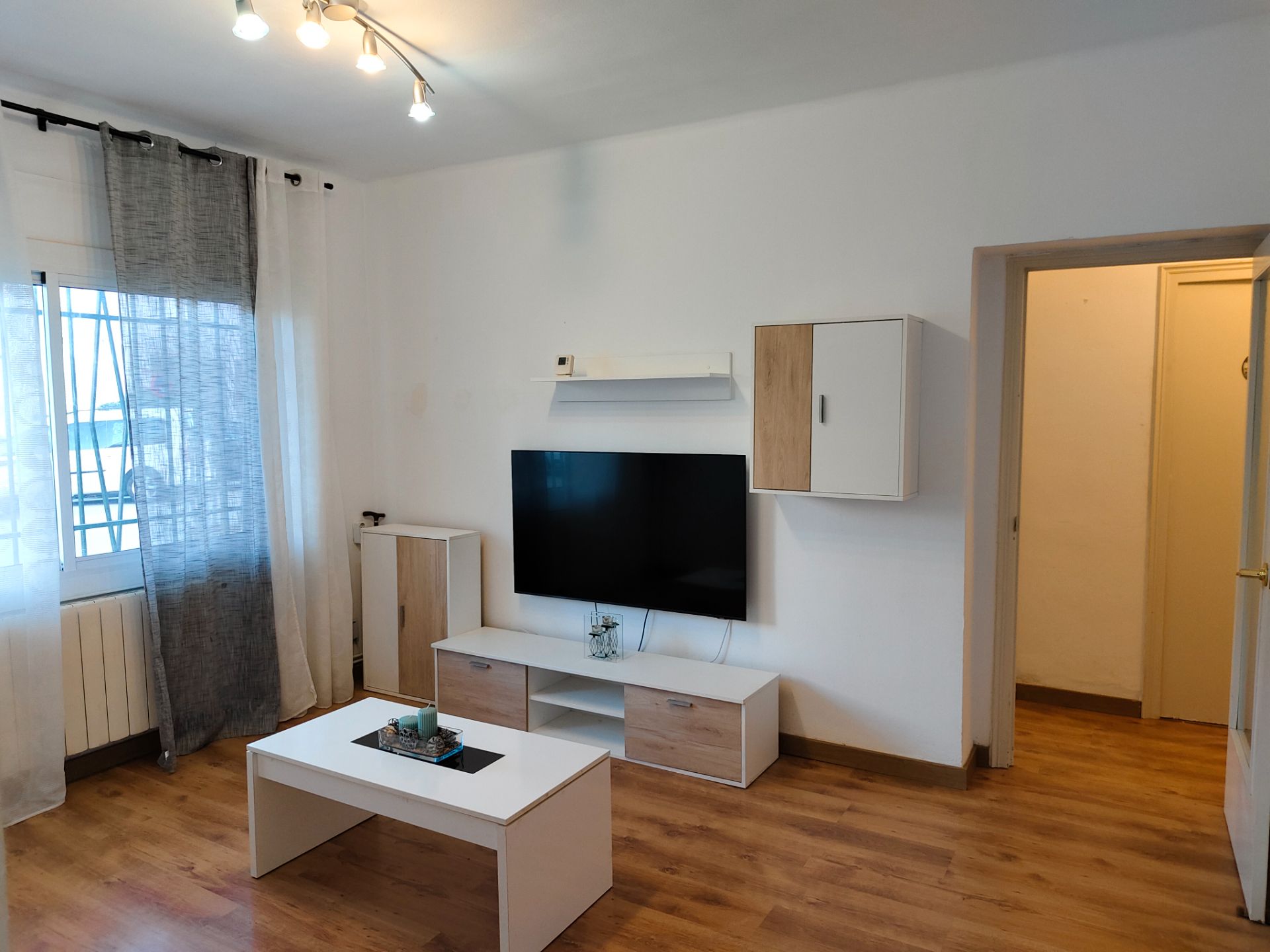 Living room of Planta baja for sale in Sarrià de Ter  with Air Conditioner, Heating and Parquet flooring