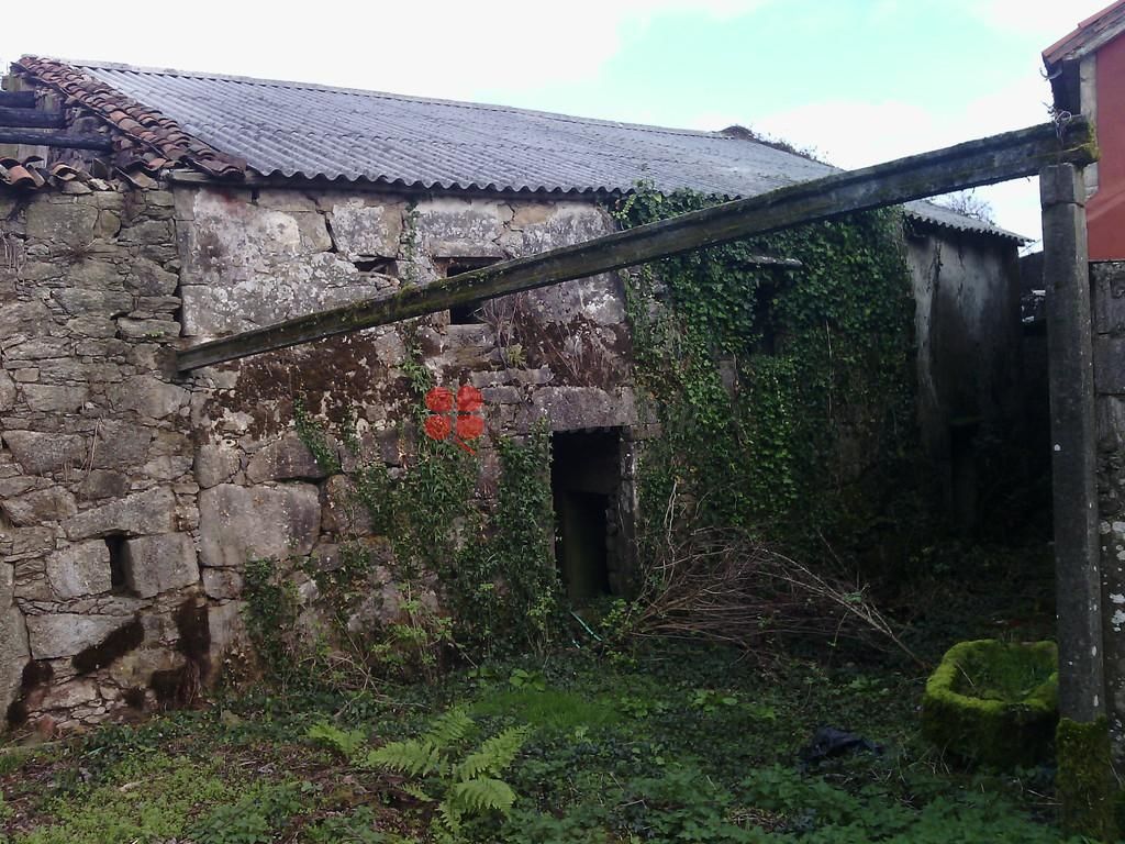 Vista exterior de Casa o xalet en venda en Brión amb Jardí privat