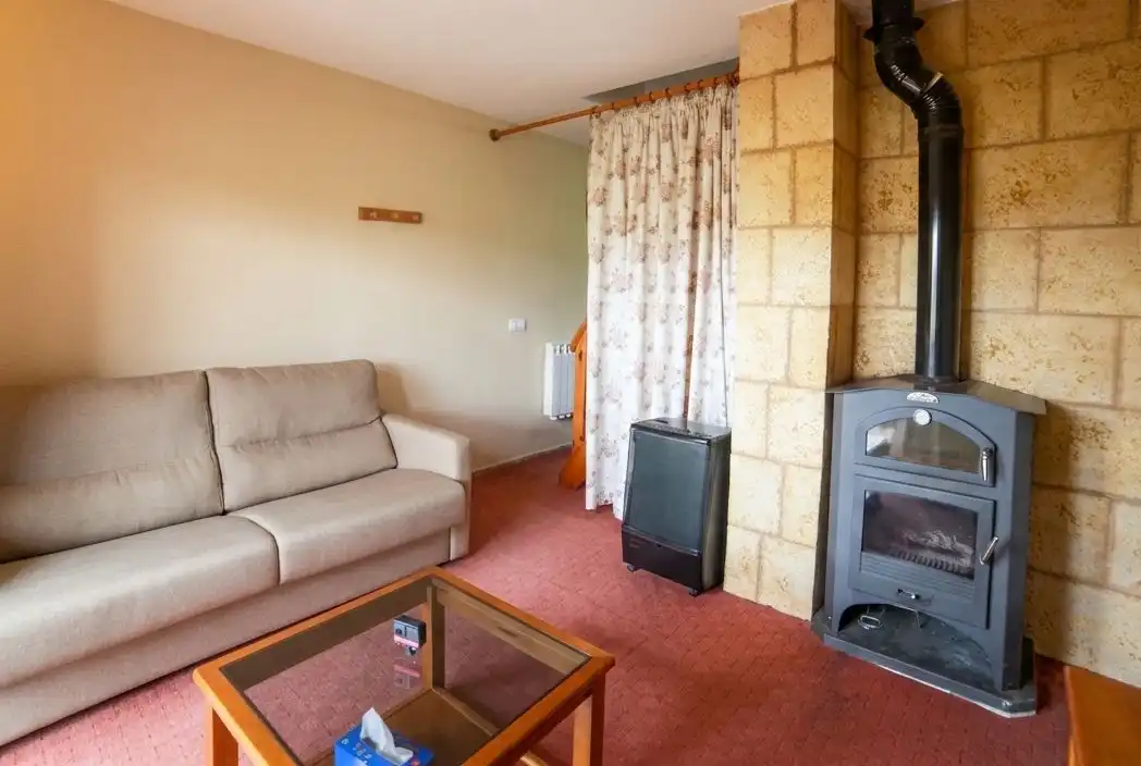 Sala d'estar de Apartament en venda en Alcalá de la Selva amb Calefacció, Terrassa i Moblat