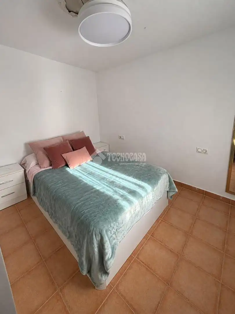 Habitación de Casa adosada en venta en Ayamonte con Aire acondicionado y Terraza