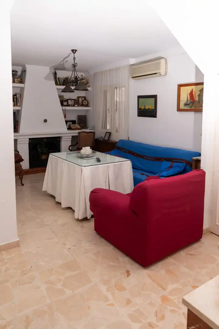 Sala de estar de Casa adosada en venta en Almonte con Terraza, Trastero y Balcón