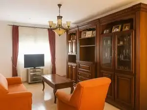 Sala d'estar de Casa adosada en venda en Marmolejo amb Jardí privat, Terrassa i Balcó