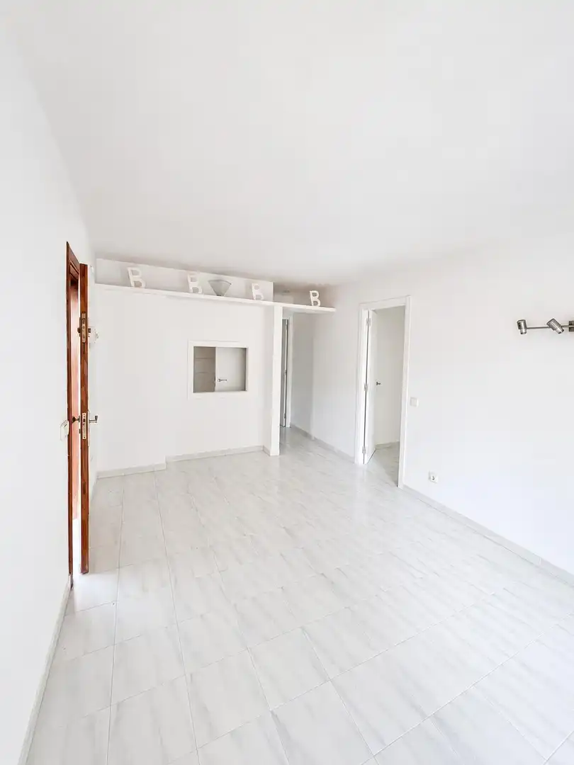 Sala d'estar de Casa adosada en venda en Calvià amb Jardí privat, Terrassa i Piscina comunitària