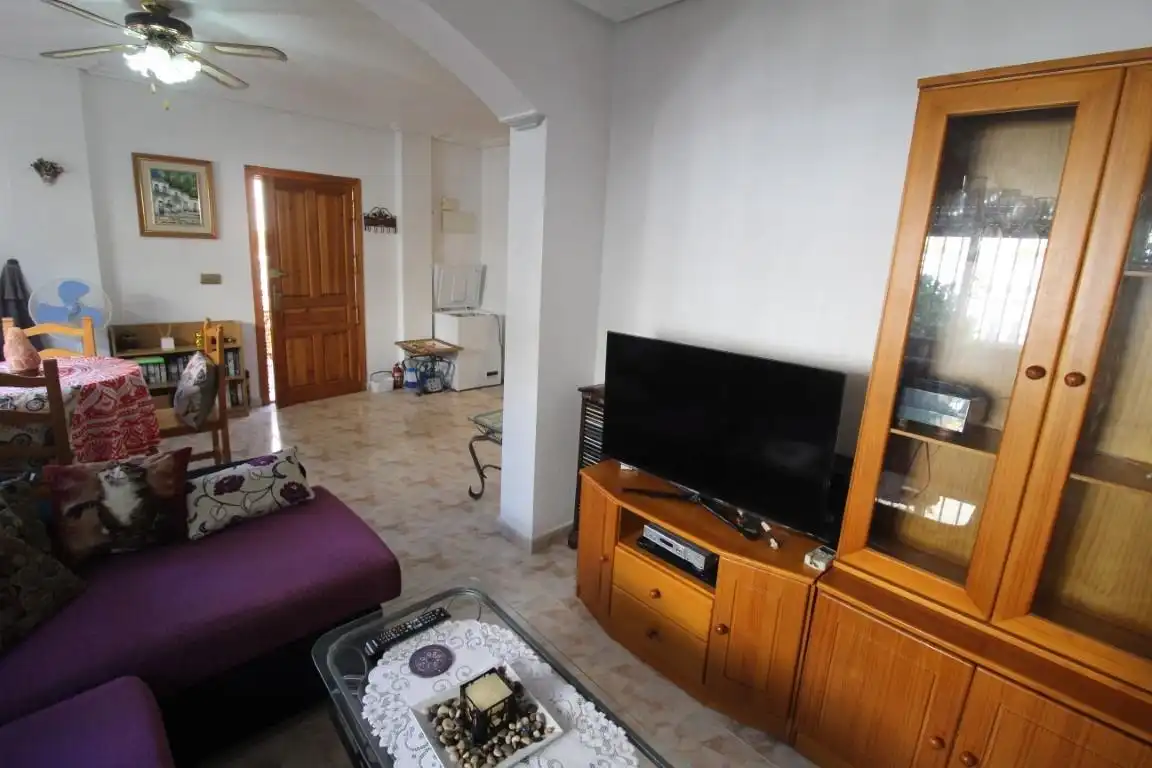 Sala d'estar de Casa adosada en venda en Orihuela amb Jardí privat, Terrassa i Moblat