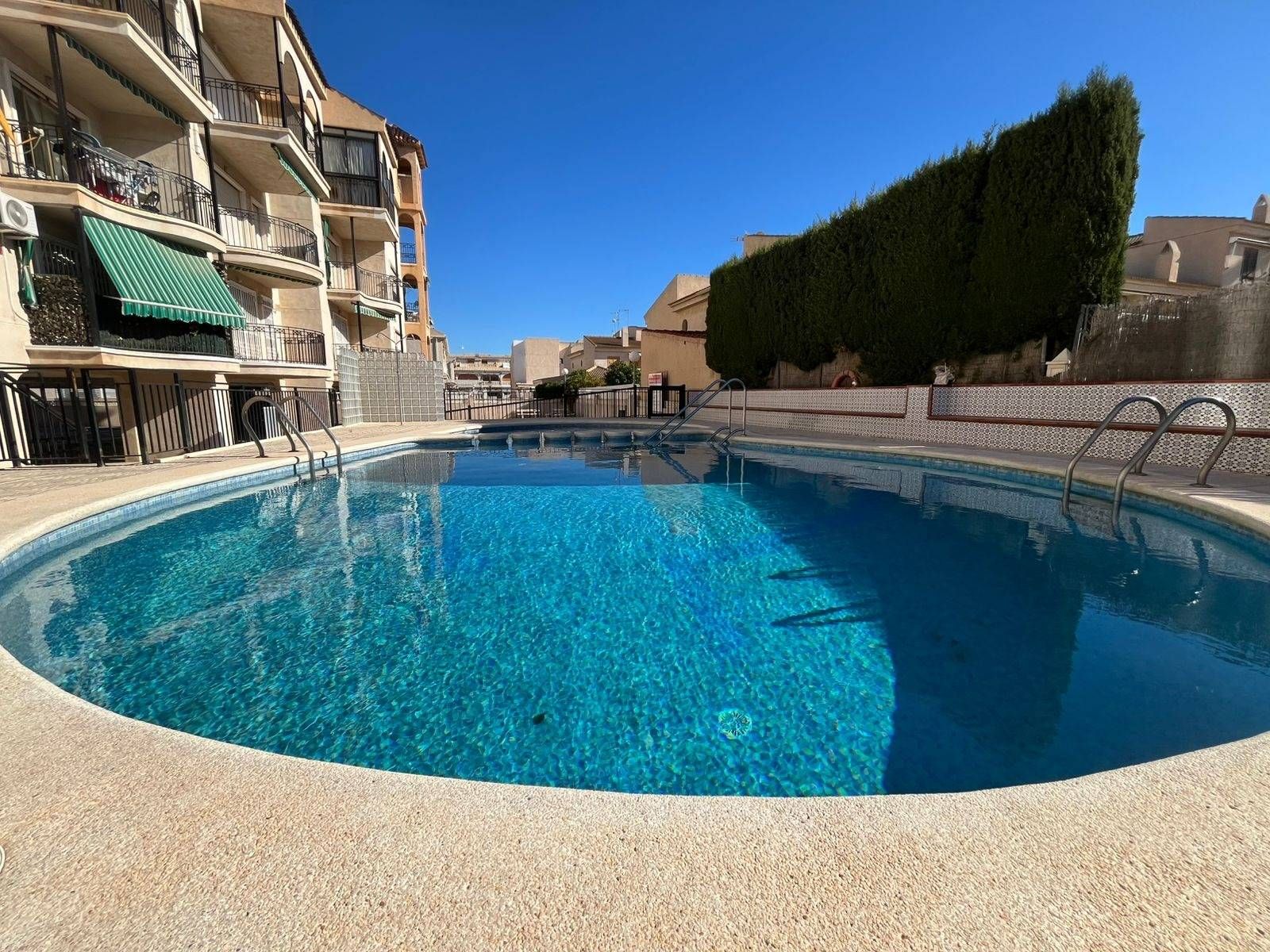 Swimming pool of Flat for sale in Santa Pola  with Air Conditioner, Storage room and Alarm