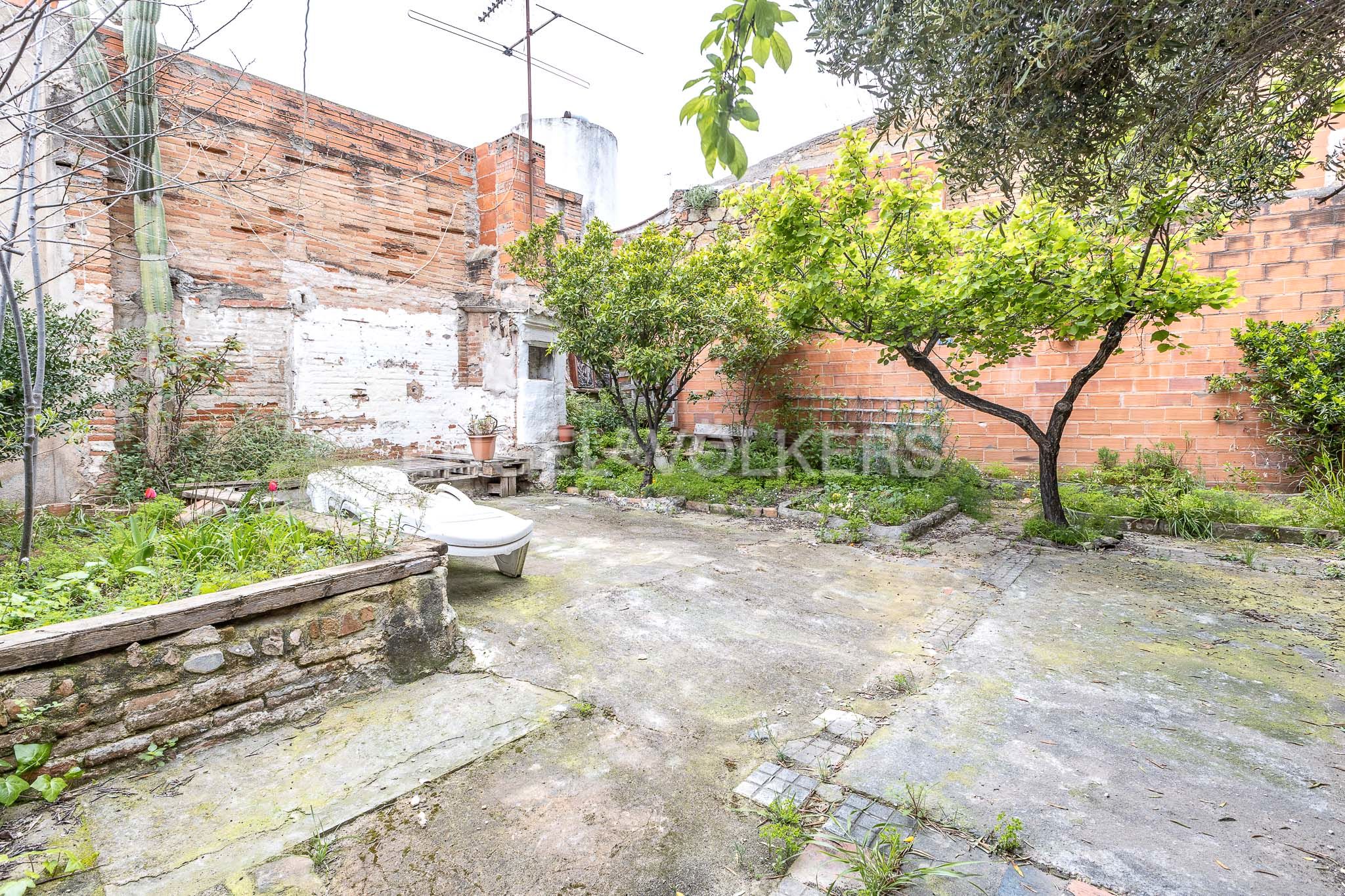 Jardín de Casa adosada en venta en Santa Coloma de Gramenet con Aire acondicionado, Calefacción y Jardín privado