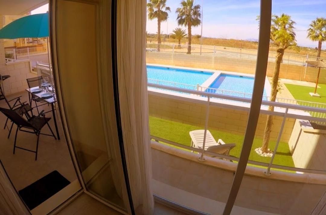 Swimming pool of Flat for sale in Guardamar del Segura  with Air Conditioner, Private garden and Terrace