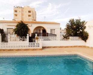 Swimming pool of House or chalet for sale in Torrevieja  with Air Conditioner, Private garden and Terrace