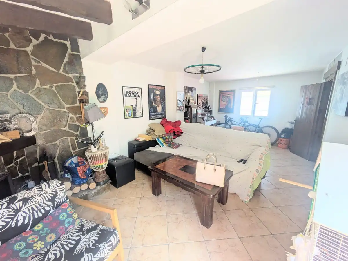Sala d'estar de Casa adosada en venda en Torremolinos amb Aire condicionat, Calefacció i Jardí privat