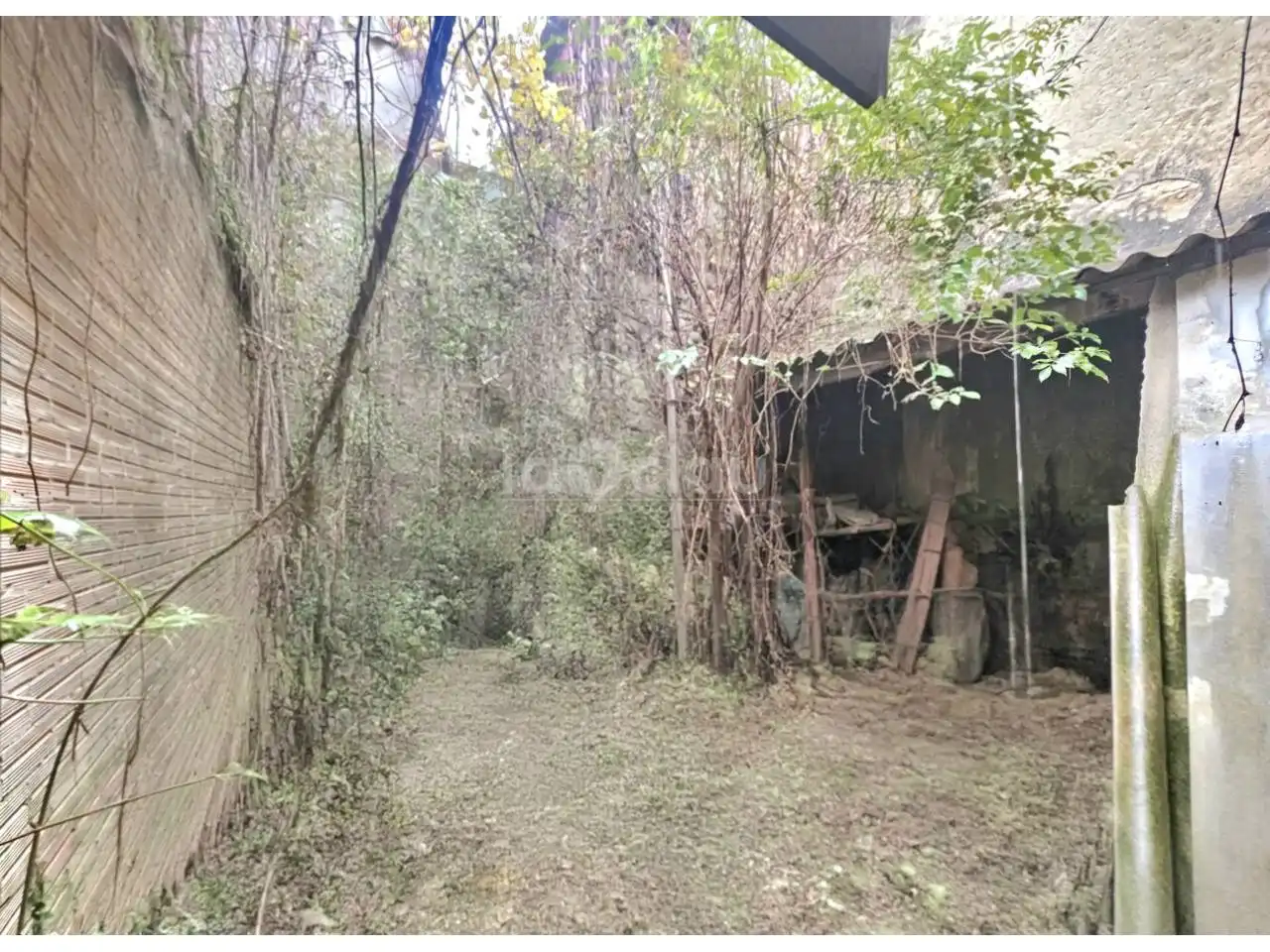 Einfamilien-Reihenhaus zum Verkauf in Tona mit Privatgarten und Terrasse
