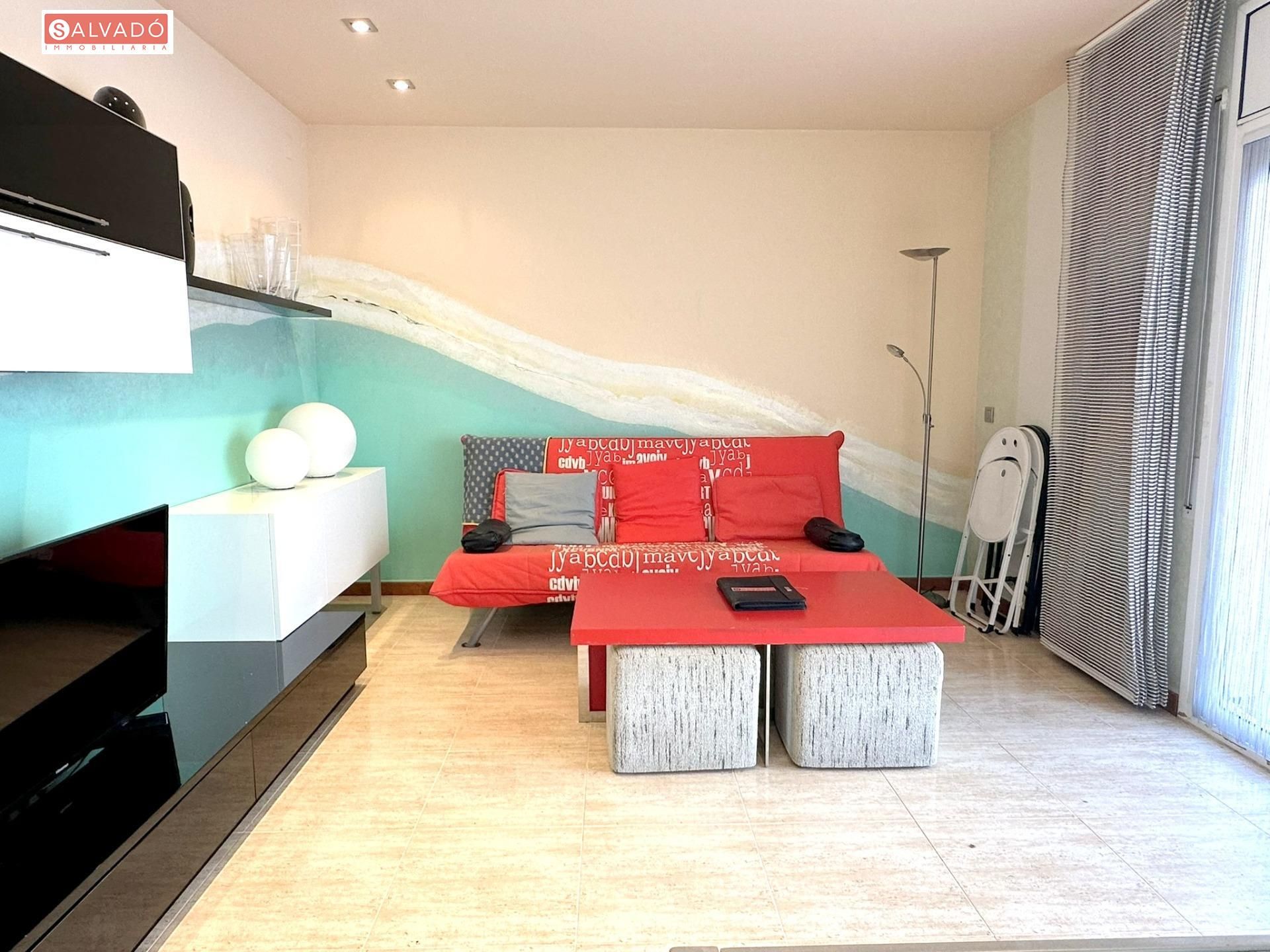 Living room of Planta baja for sale in Calafell  with Air Conditioner, Terrace and Storage room