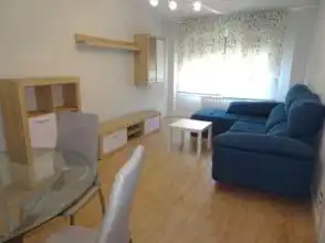 Sala d'estar de Pis de lloguer en Gijón  amb Calefacció, Parquet i Moblat