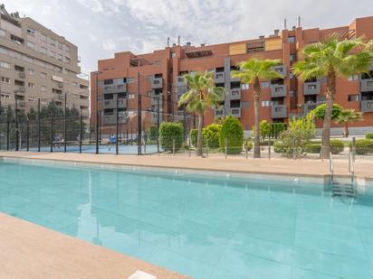 Swimming pool of Flat for sale in  Granada Capital  with Air Conditioner, Heating and Private garden