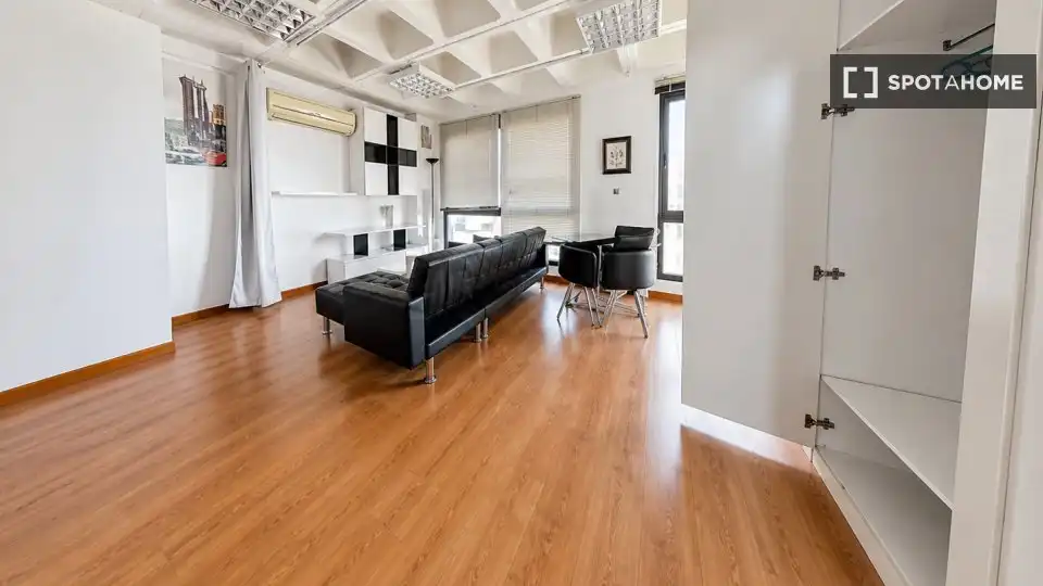 Sala de estar de Estudio para compartir en Sevilla con Aire acondicionado, Terraza y Amueblado