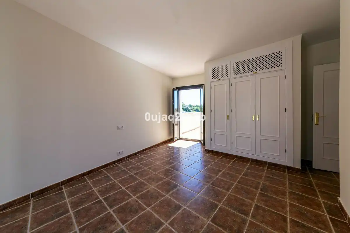 Habitación de Casa adosada de alquiler en Estepona con Aire acondicionado, Jardín privado y Terraza