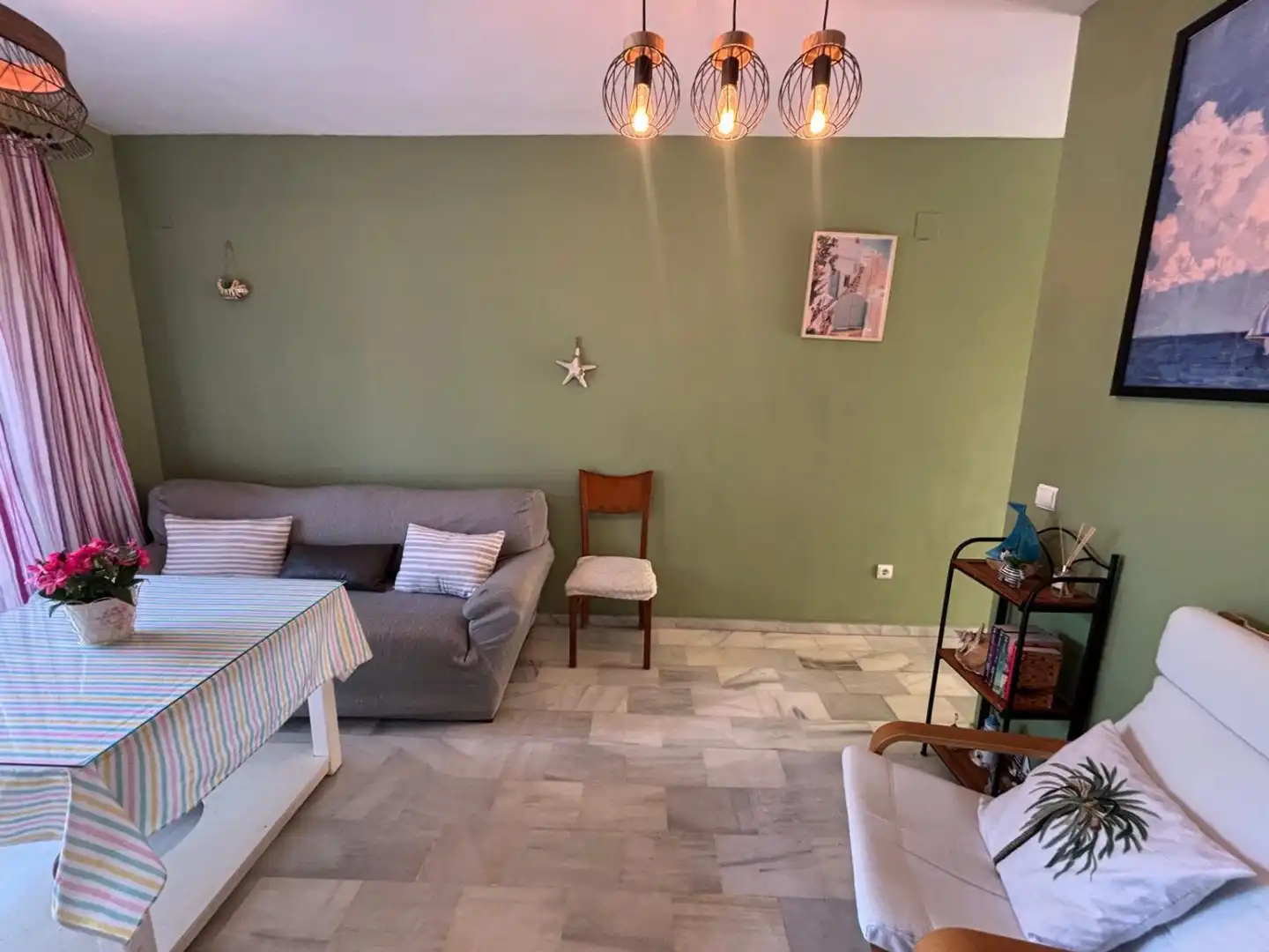 Sala de estar de Casa adosada en venta en Islantilla con Terraza, Trastero y Piscina comunitaria