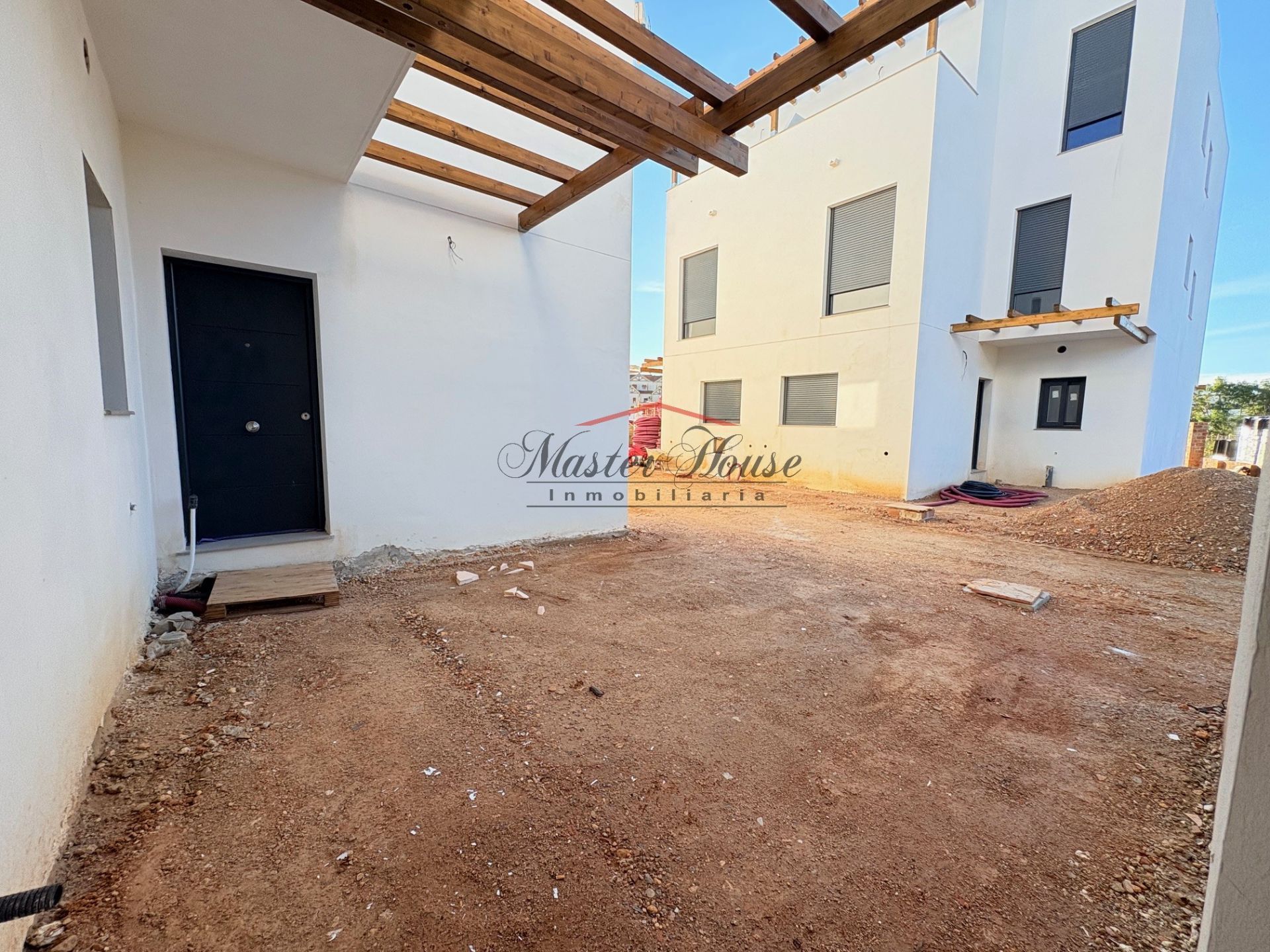 Vista exterior de Casa adosada en venta en Aljaraque con Calefacción, Jardín privado y Terraza