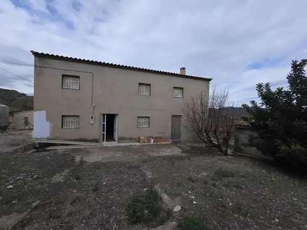 Vista exterior de Finca rústica en venda en Lubrín amb Jardí privat, Traster i Moblat