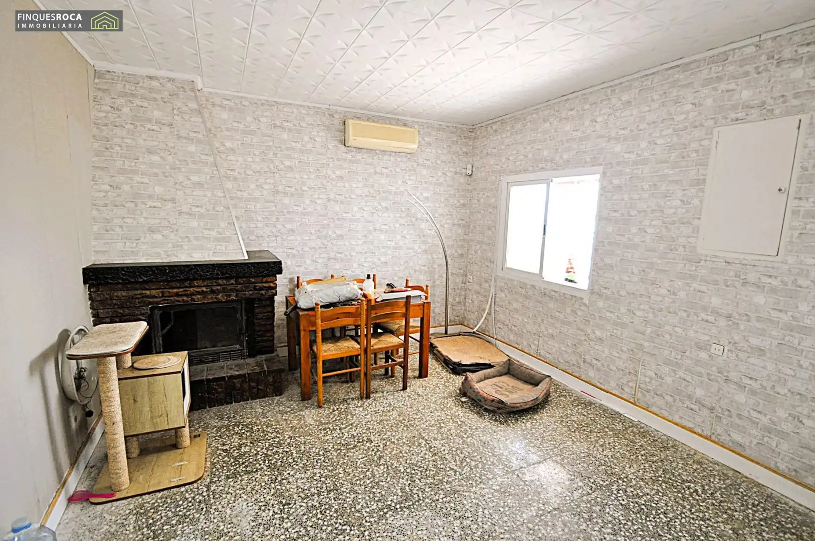 Sala de estar de Casa o chalet en venta en L'Aldea con Aire acondicionado, Calefacción y Jardín privado